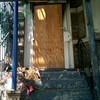 Boarded up home in the Bronx that has been foreclosed.